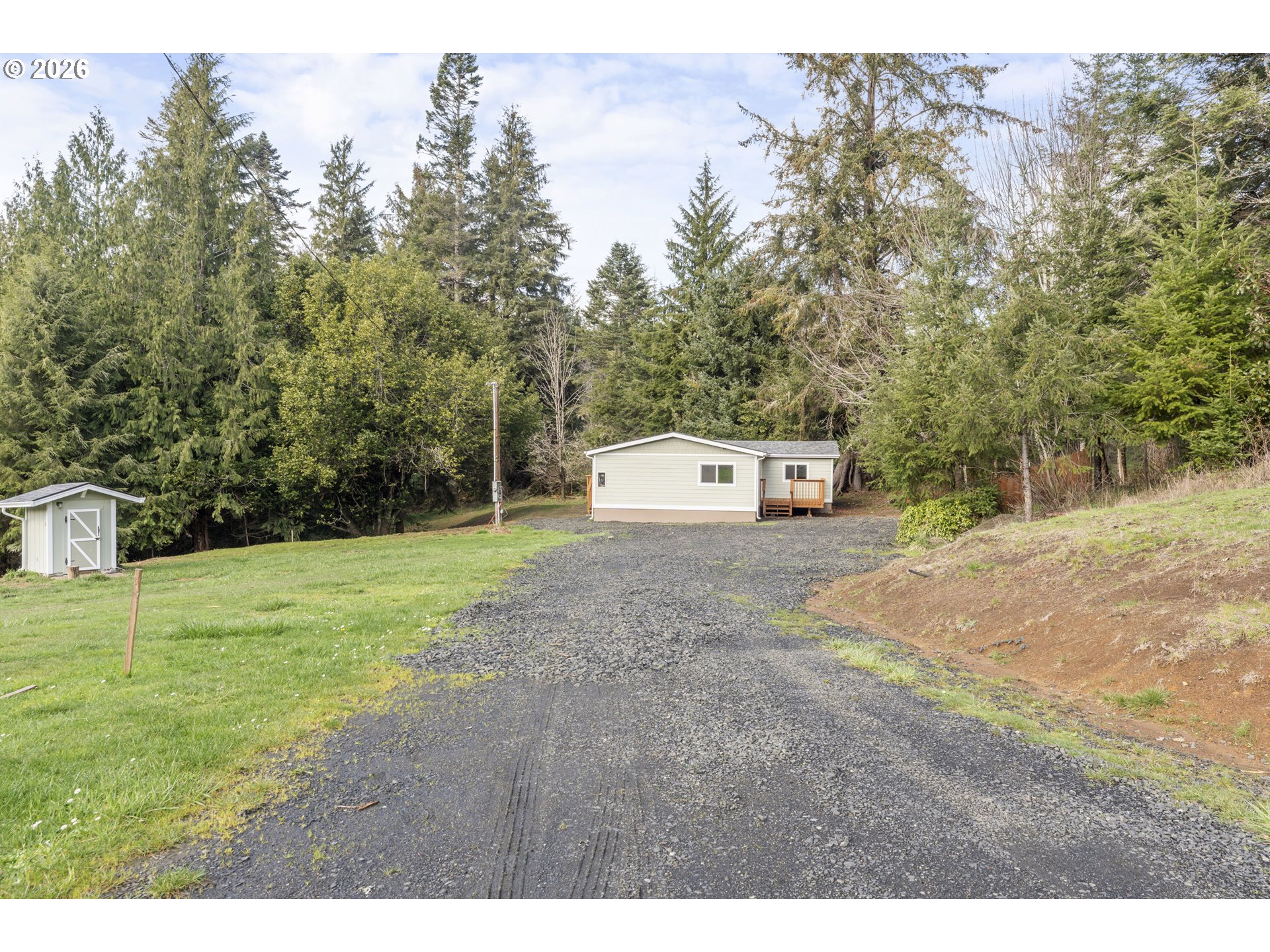 61912 Olive Barber Road Coos Bay, OR 97420 - Photo 23 of 31 a big yard with lots of green space