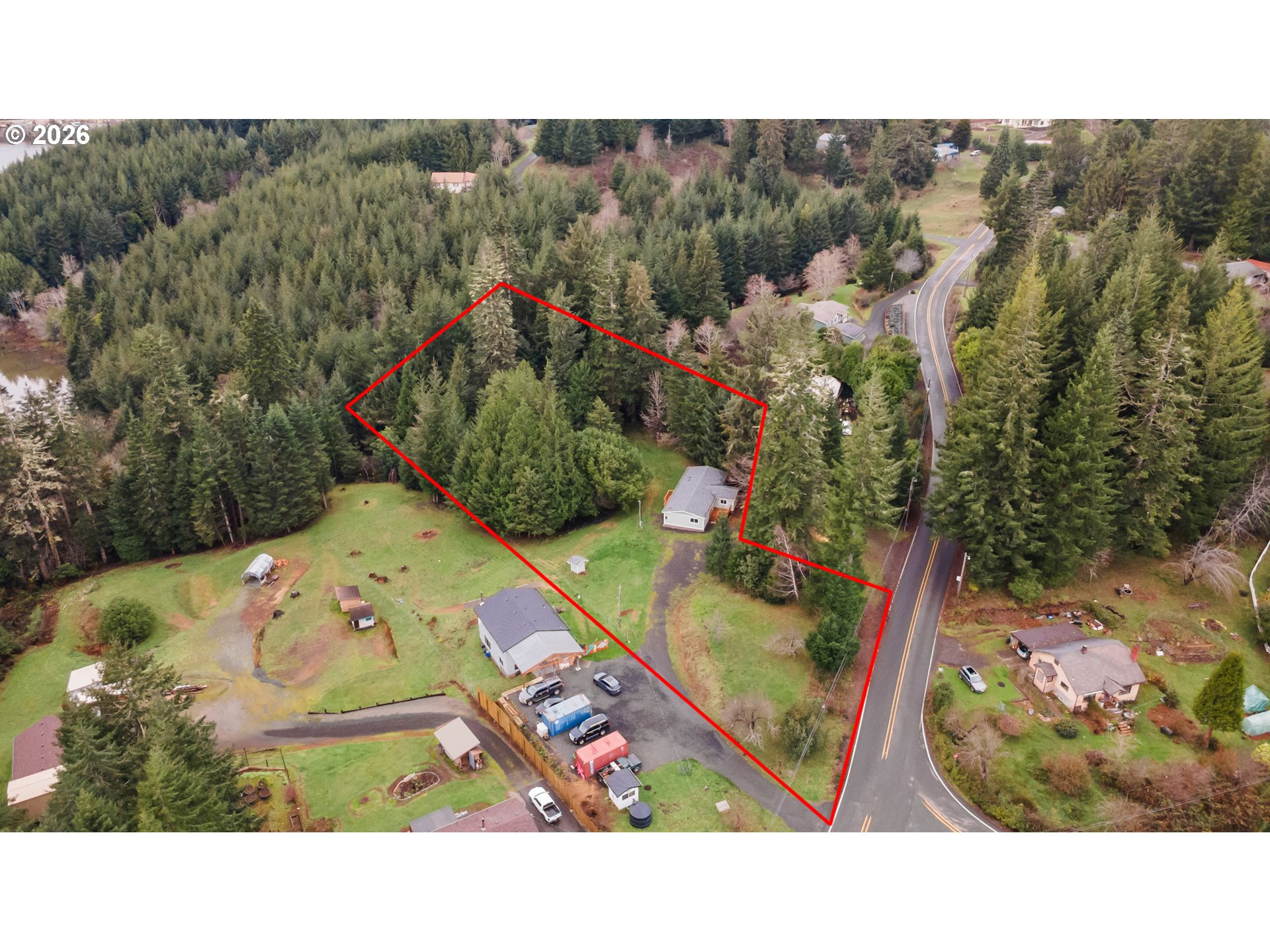 61912 Olive Barber Road Coos Bay, OR 97420 - Photo 25 of 31 a black and white photo of a room