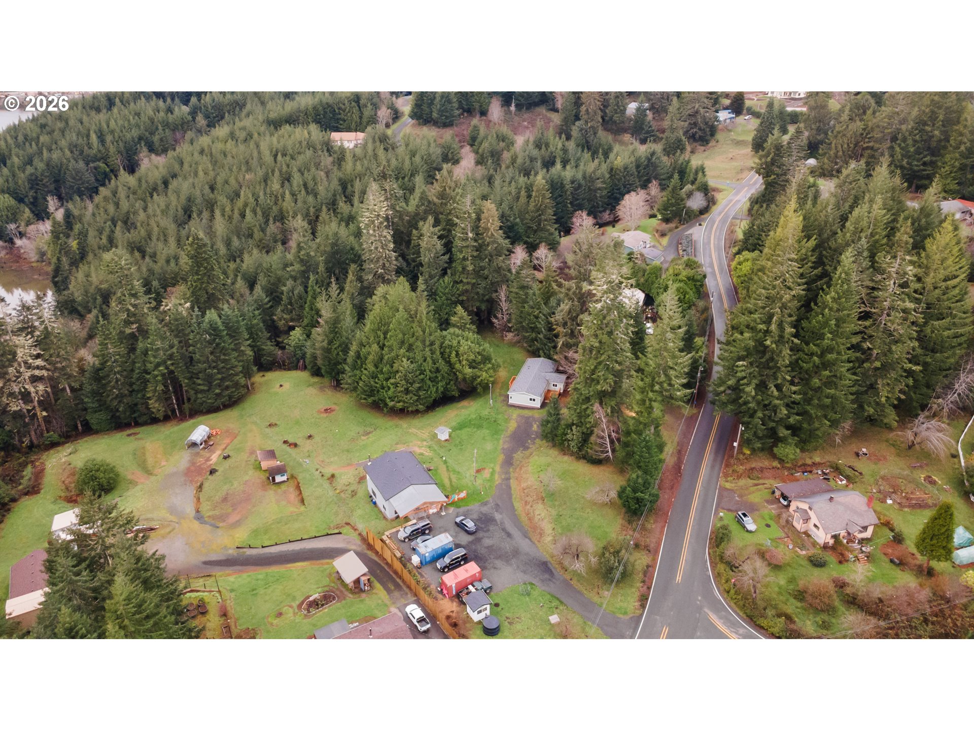 61912 Olive Barber Road Coos Bay, OR 97420 - Photo 26 of 31 a back yard with green space
