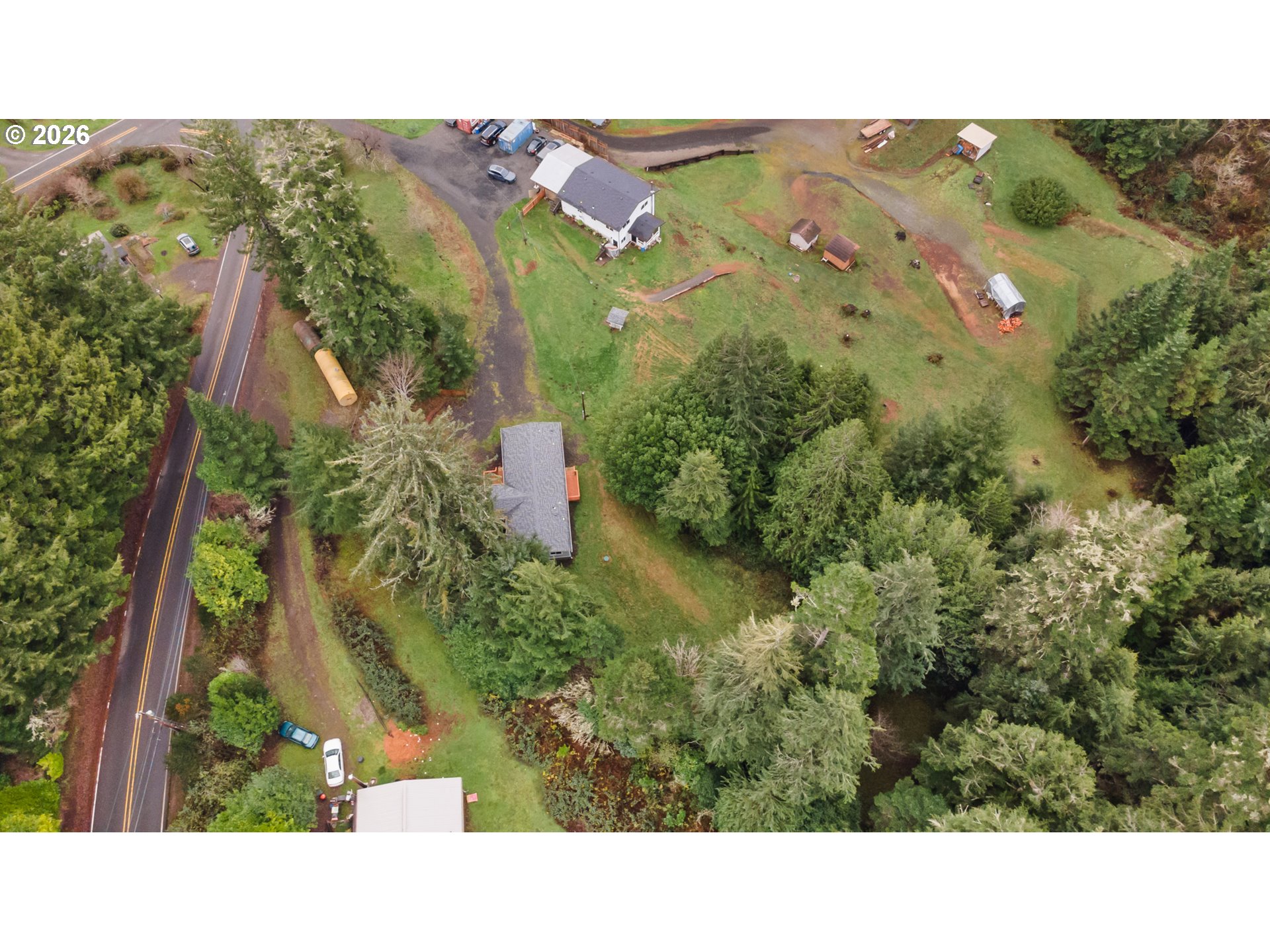 61912 Olive Barber Road Coos Bay, OR 97420 - Photo 29 of 31 a black and white photo of a house