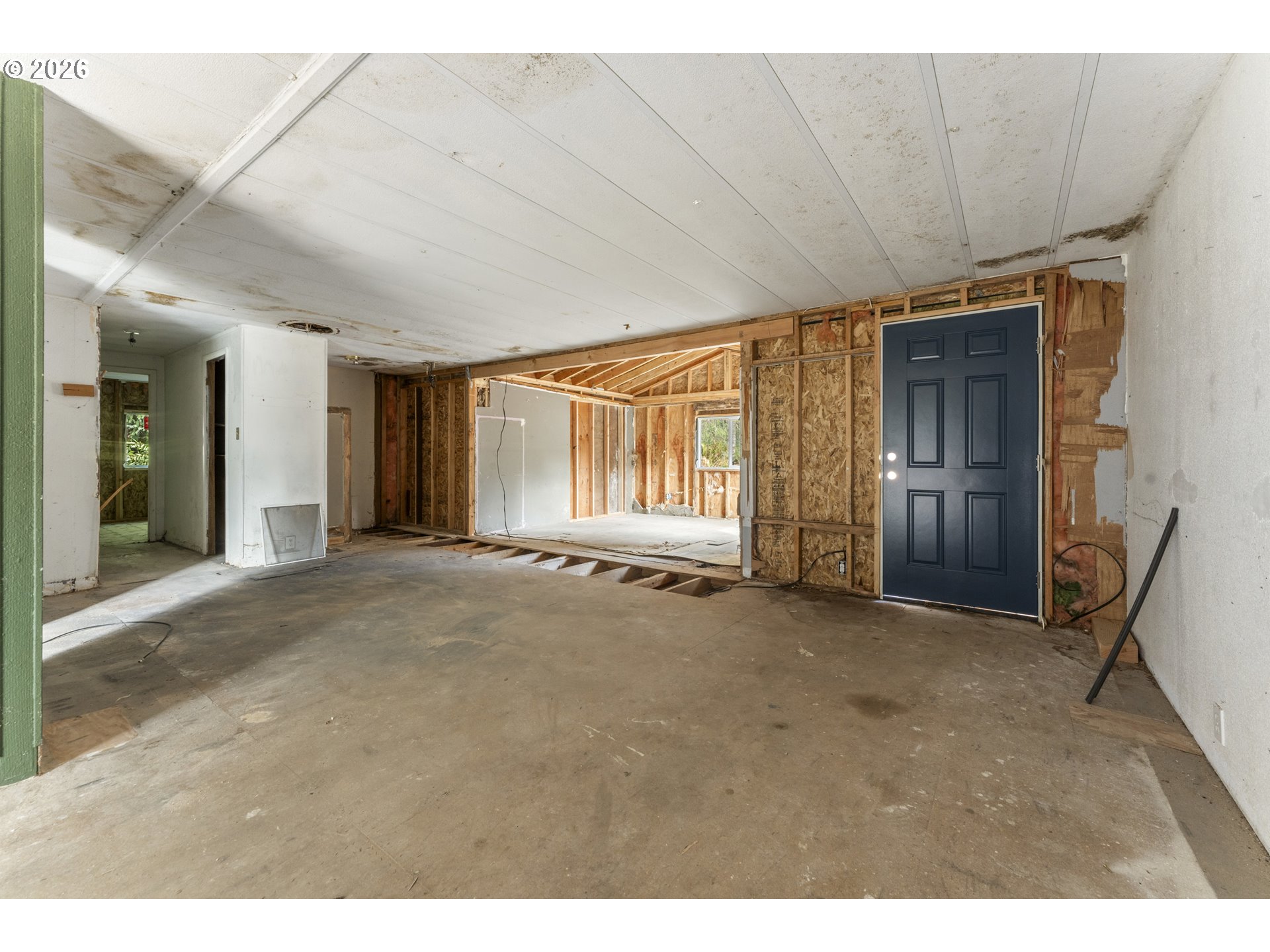 61912 Olive Barber Road Coos Bay, OR 97420 - Photo 3 of 31 a view of an empty room with closet and a window