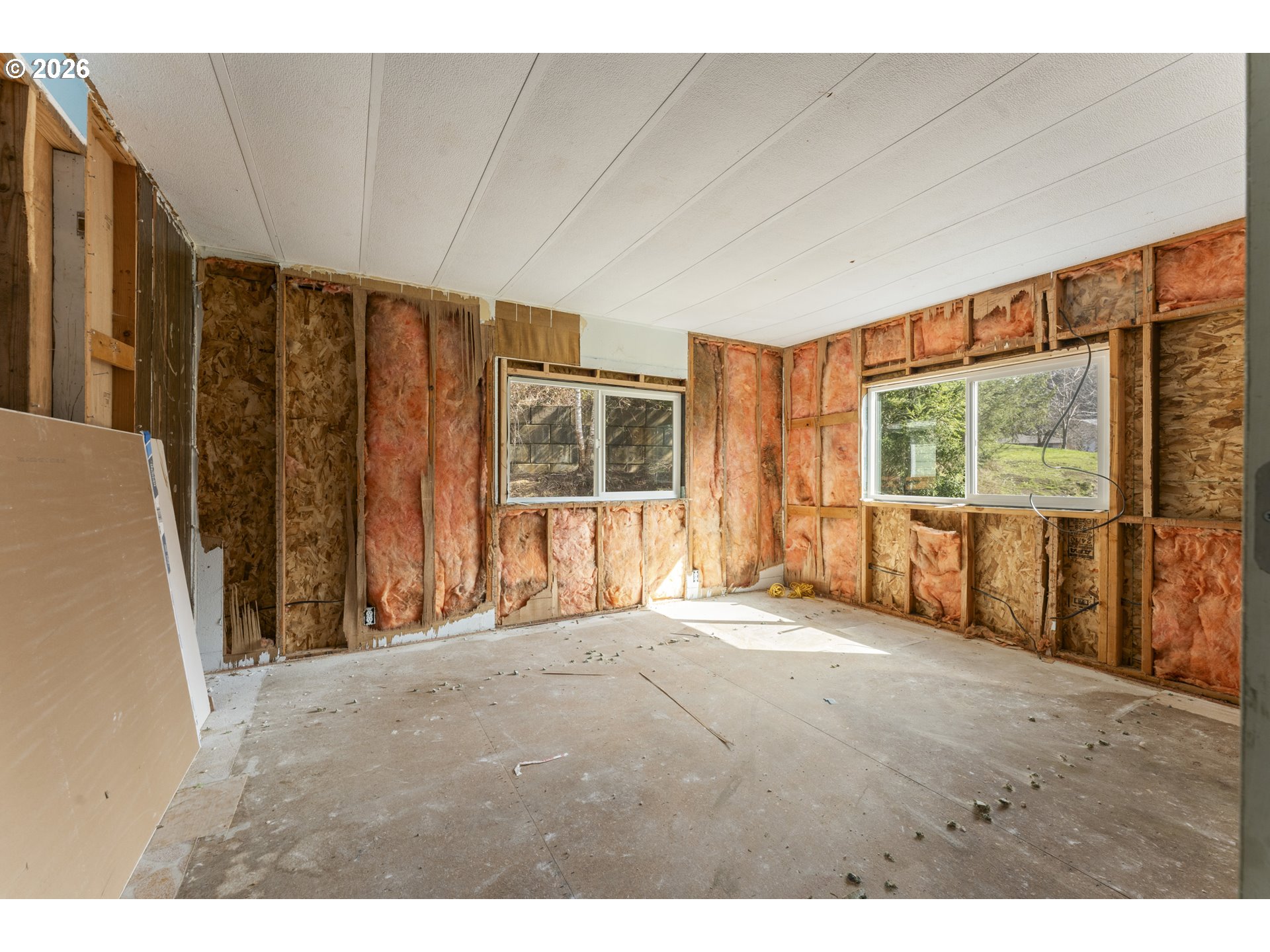 61912 Olive Barber Road Coos Bay, OR 97420 - Photo 10 of 31 a view of an empty room with a window