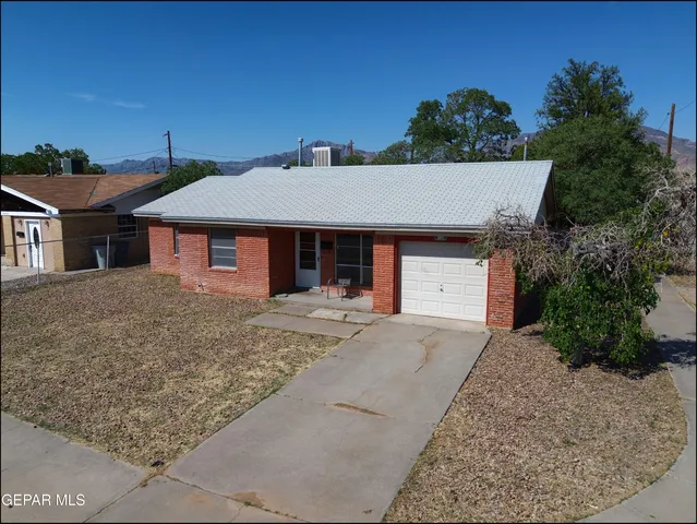 front view of a house with an outdoor space