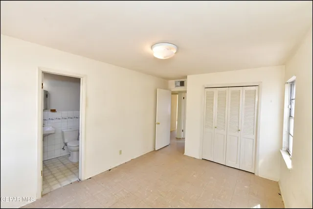a view of a room with a wardrobe space