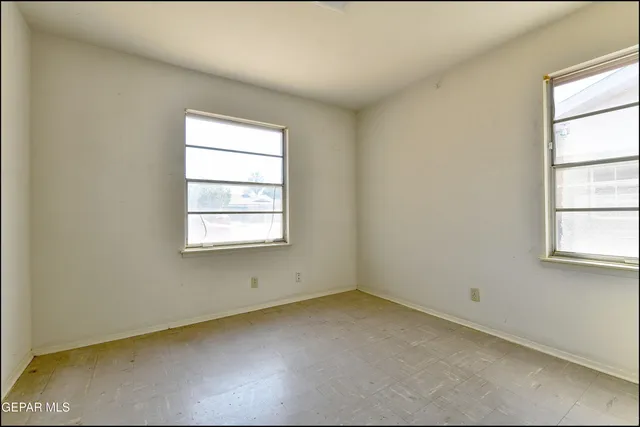 an empty room with a window