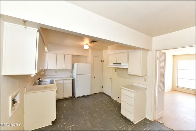 a room with dryer and washer