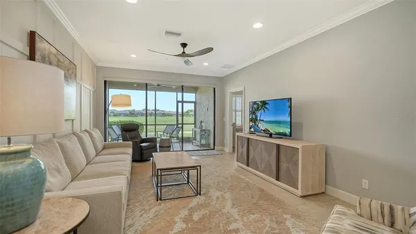 a bedroom with a bed and a night stand