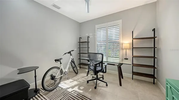 a view of a lake with a yard