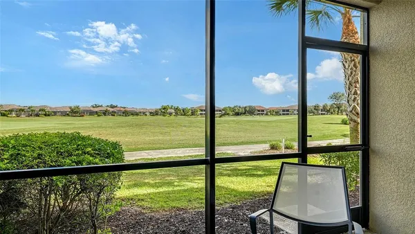 a view of a city with an ocean