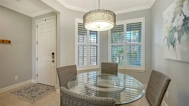 a kitchen with stainless steel appliances granite countertop a refrigerator a stove and a sink