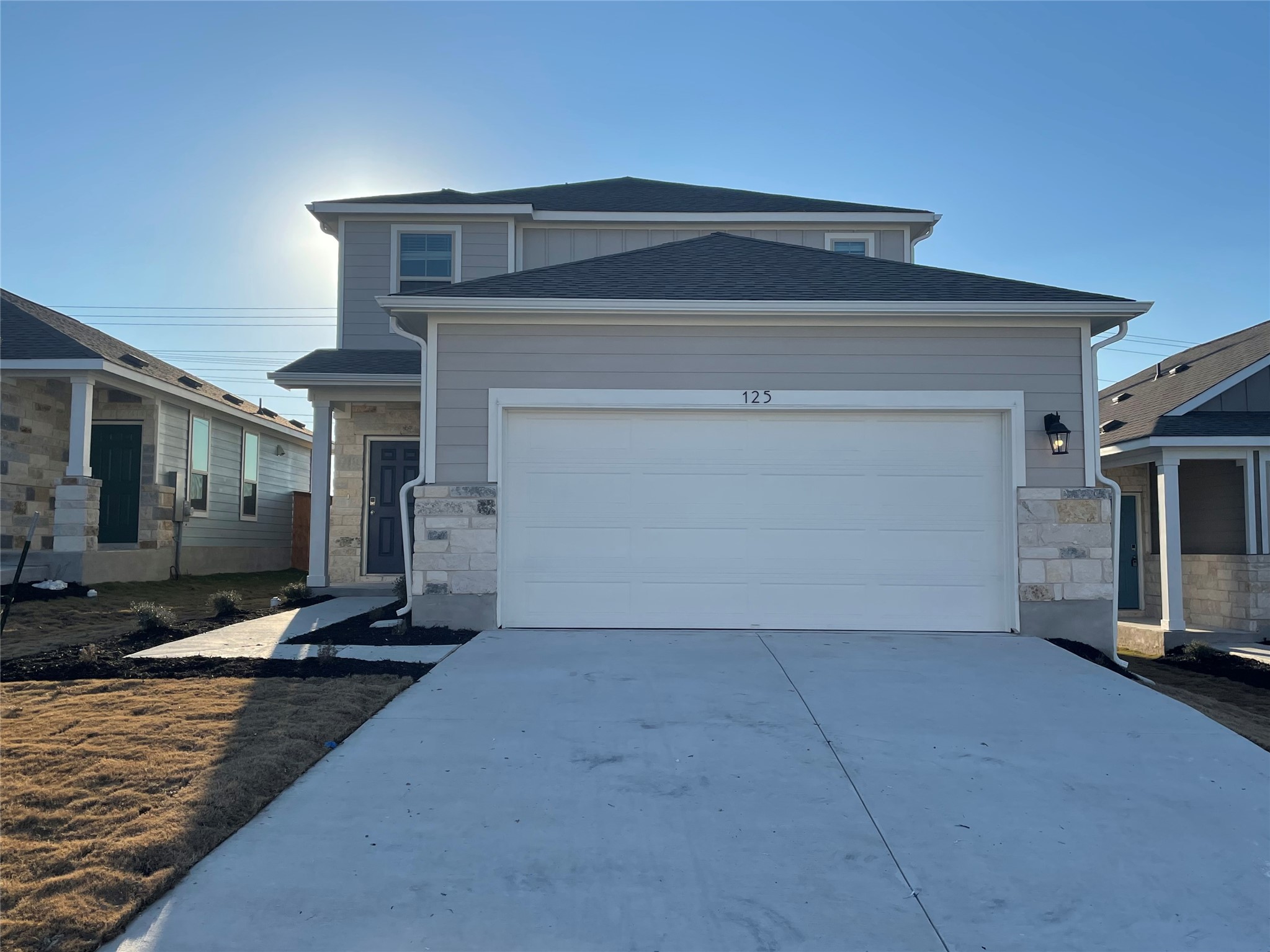 a view of a livingroom with furniture and a fireplace