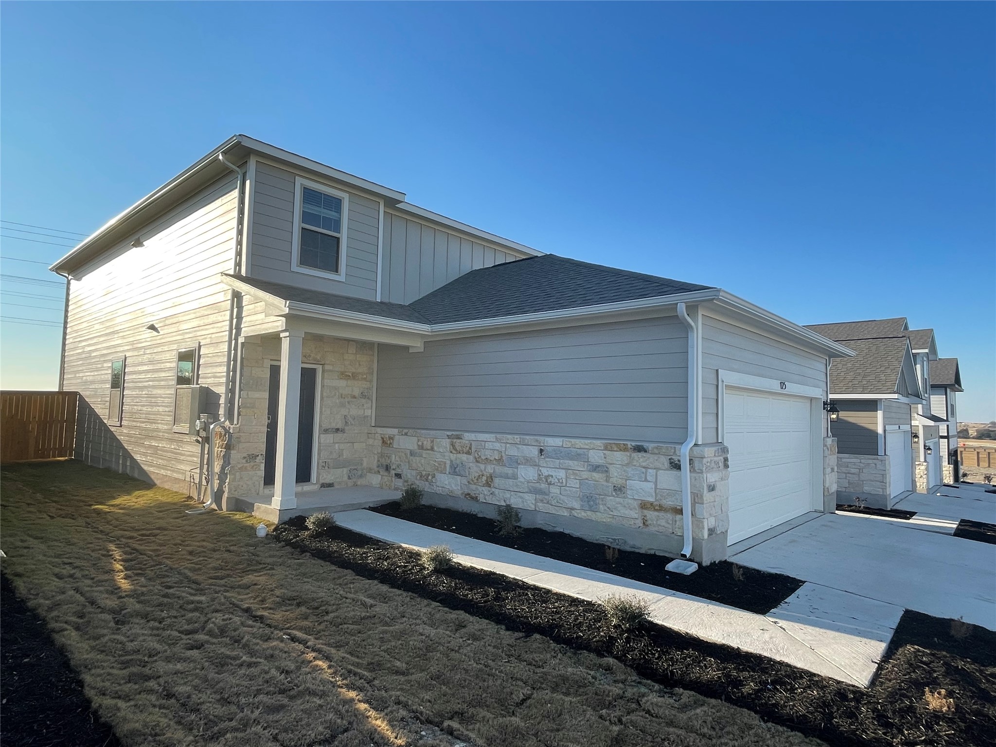 125 Old Stagecoach Road Jarrell, TX 76537 - Photo 3 of 31 a front view of a house with a yard