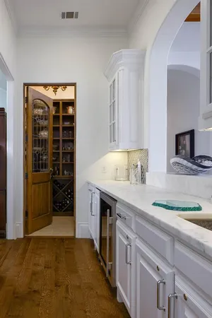 a kitchen with stainless steel appliances a stove and a refrigerator