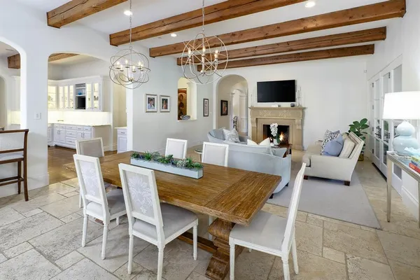 a view of a livingroom with furniture and a fireplace