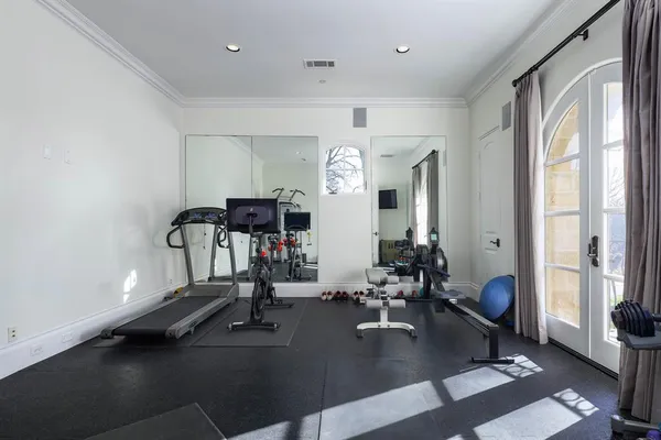 a view of a room with gym equipment