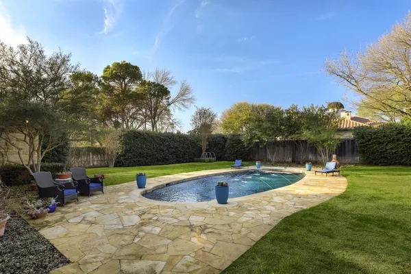 swimming pool view with a outdoor space