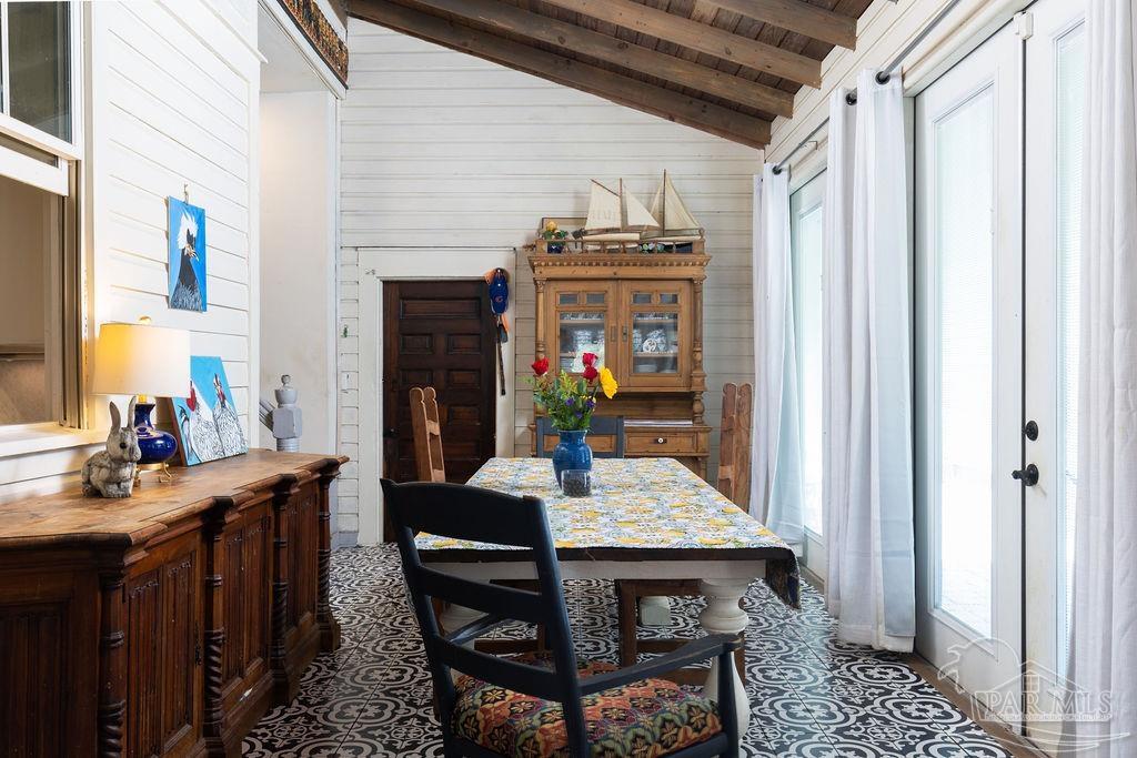 714 East La Rua Street Pensacola, FL 32501 - Photo 18 of 63 a view of a dining room with furniture window and wooden floor