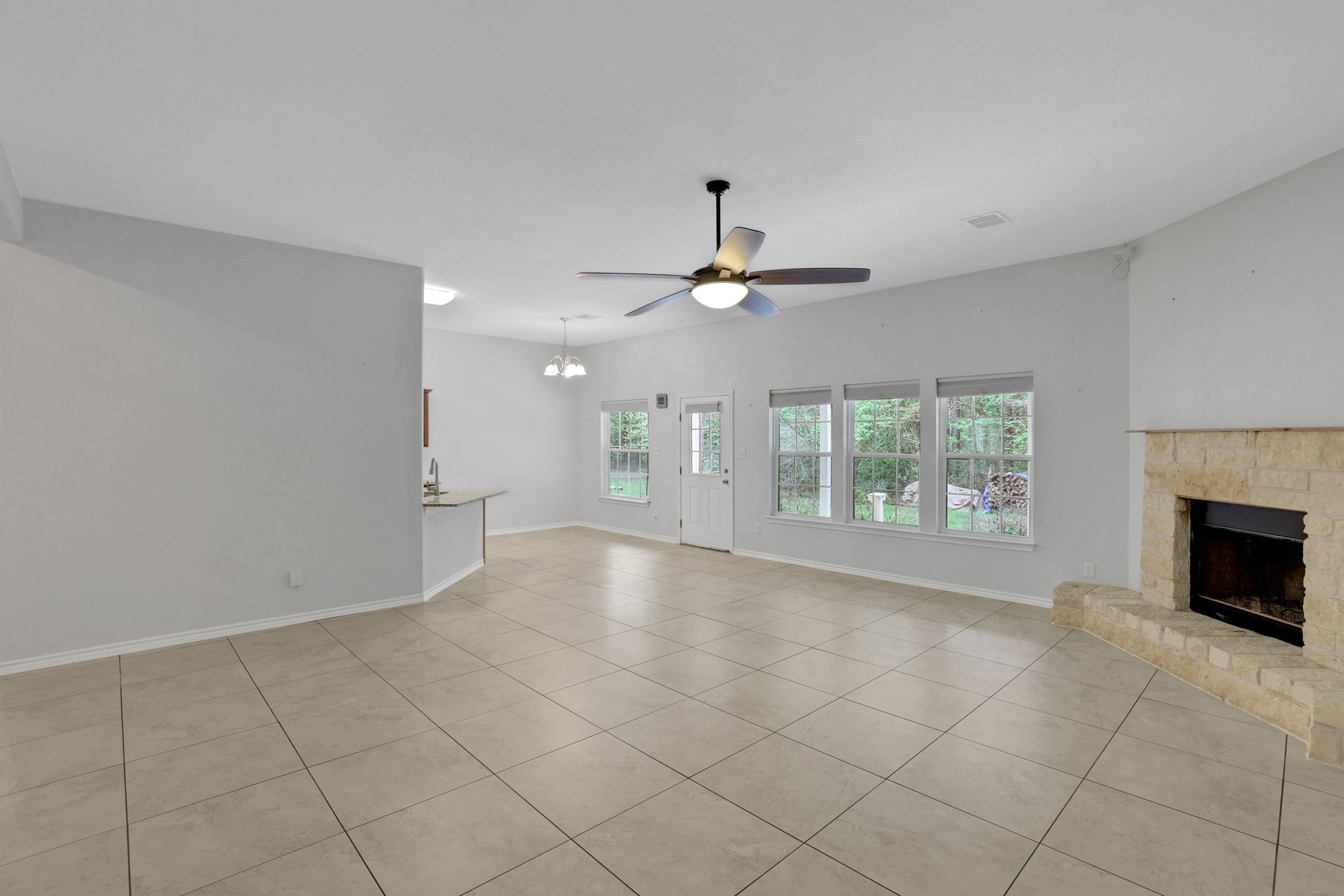 1290 Spring Ridge Road Coldspring, TX 77331 - Photo 13 of 49 The living area overlooks the back yard