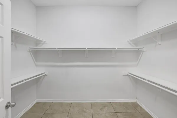 a view of an empty walk in closet