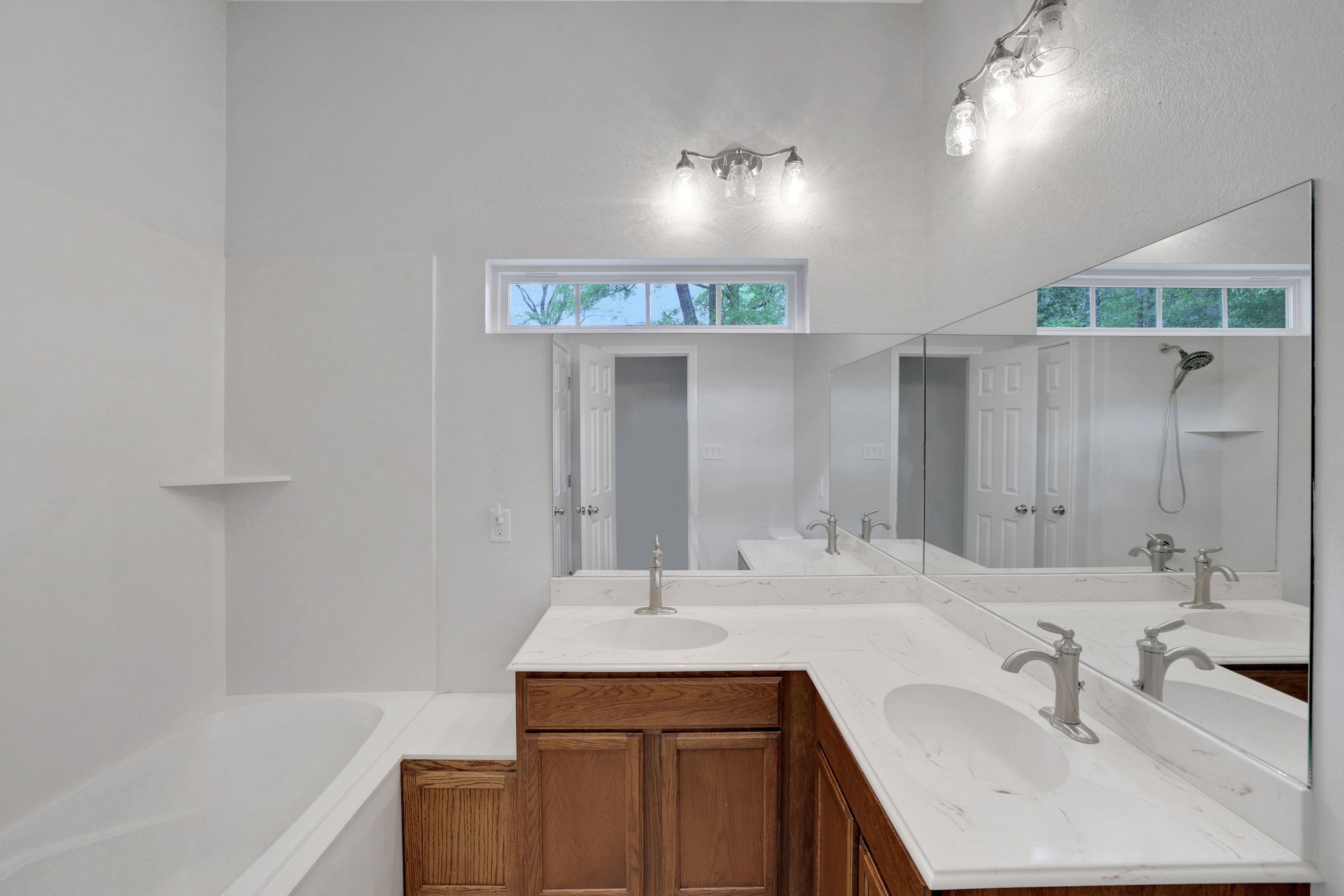 1290 Spring Ridge Road Coldspring, TX 77331 - Photo 38 of 49 Full guest bathroom with tub/shower and dual sinks