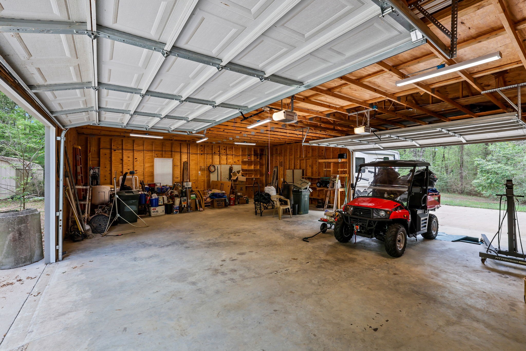 1290 Spring Ridge Road Coldspring, TX 77331 - Photo 5 of 49 Great garage for storage or using as a workshop
