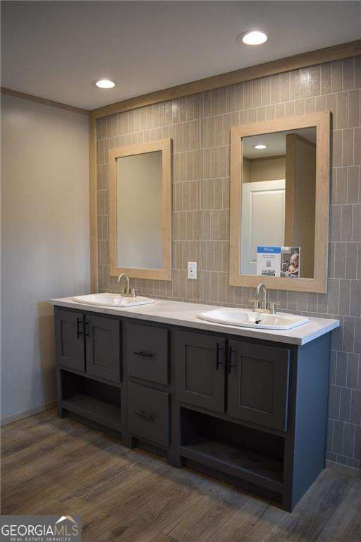 6401 Riverside Road, Unit TRACT 2 Nahunta, GA 31553 - Photo 12 of 13 a bathroom with a double vanity sink and a mirror