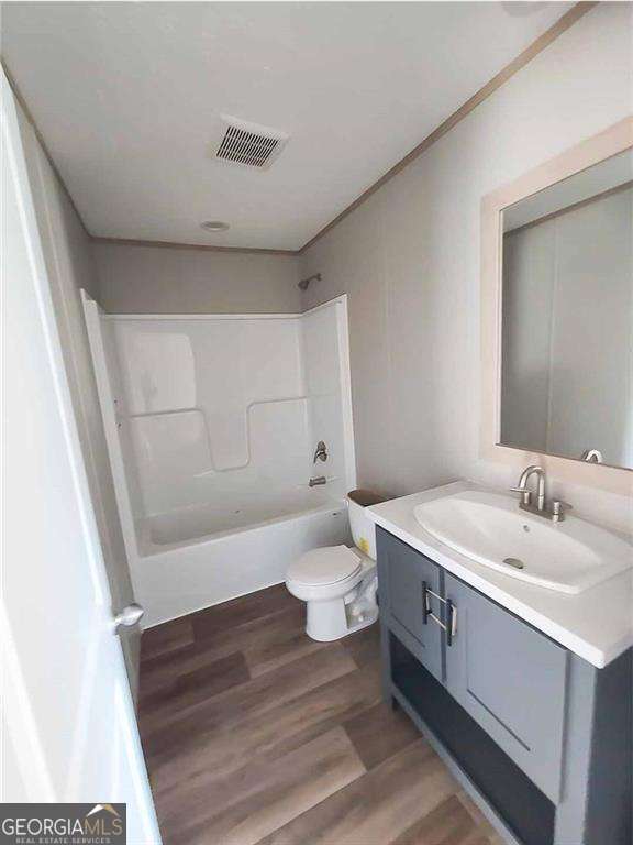 6401 Riverside Road, Unit TRACT 2 Nahunta, GA 31553 - Photo 9 of 13 a bathroom with a sink a toilet and shower