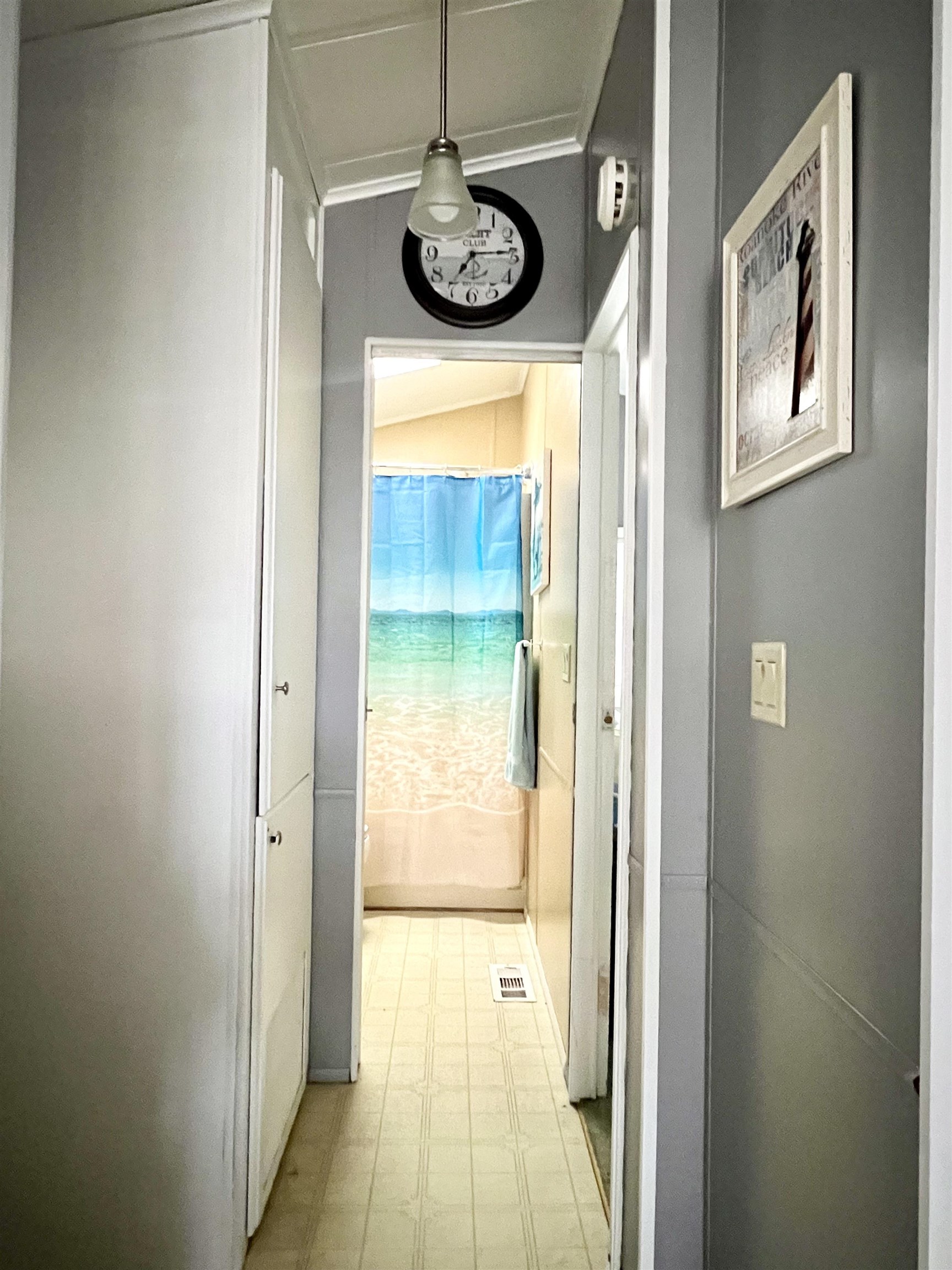 709 Seashore Road Cape May, NJ 08204 - Photo 18 of 29 a bathroom with a sink and a mirror