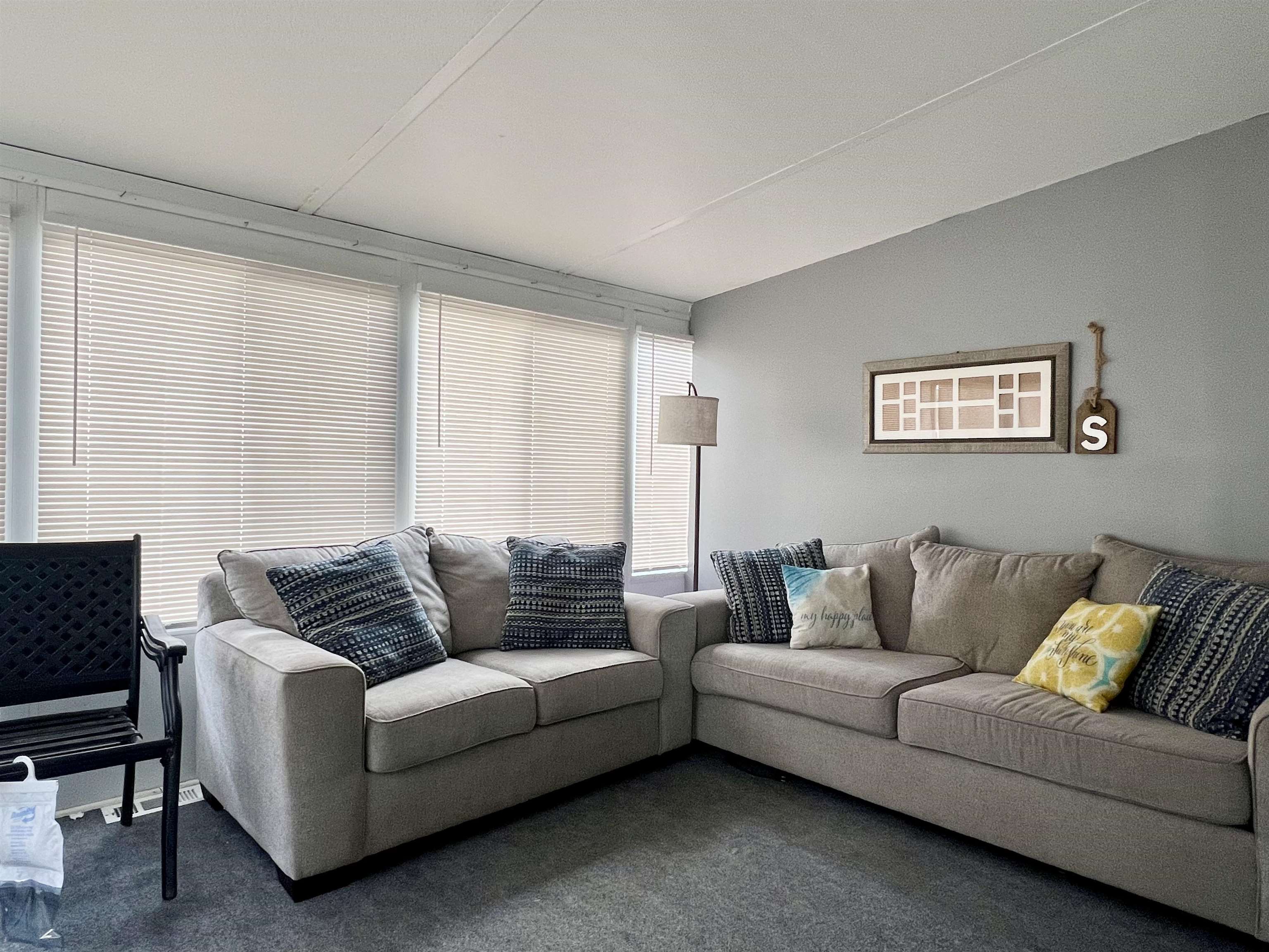 709 Seashore Road Cape May, NJ 08204 - Photo 4 of 29 a living room with furniture and a couch