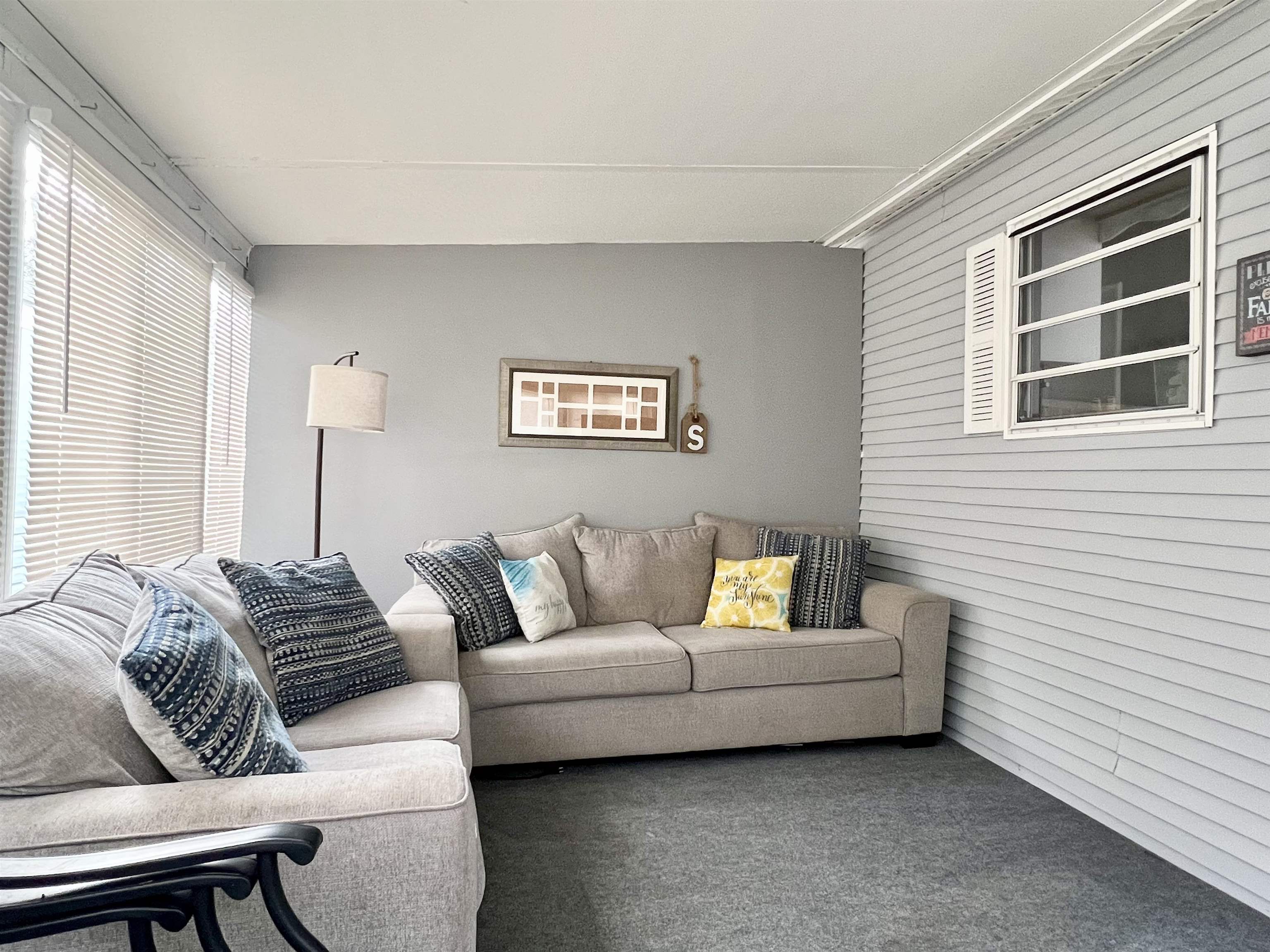 709 Seashore Road Cape May, NJ 08204 - Photo 5 of 29 a living room with furniture and a window