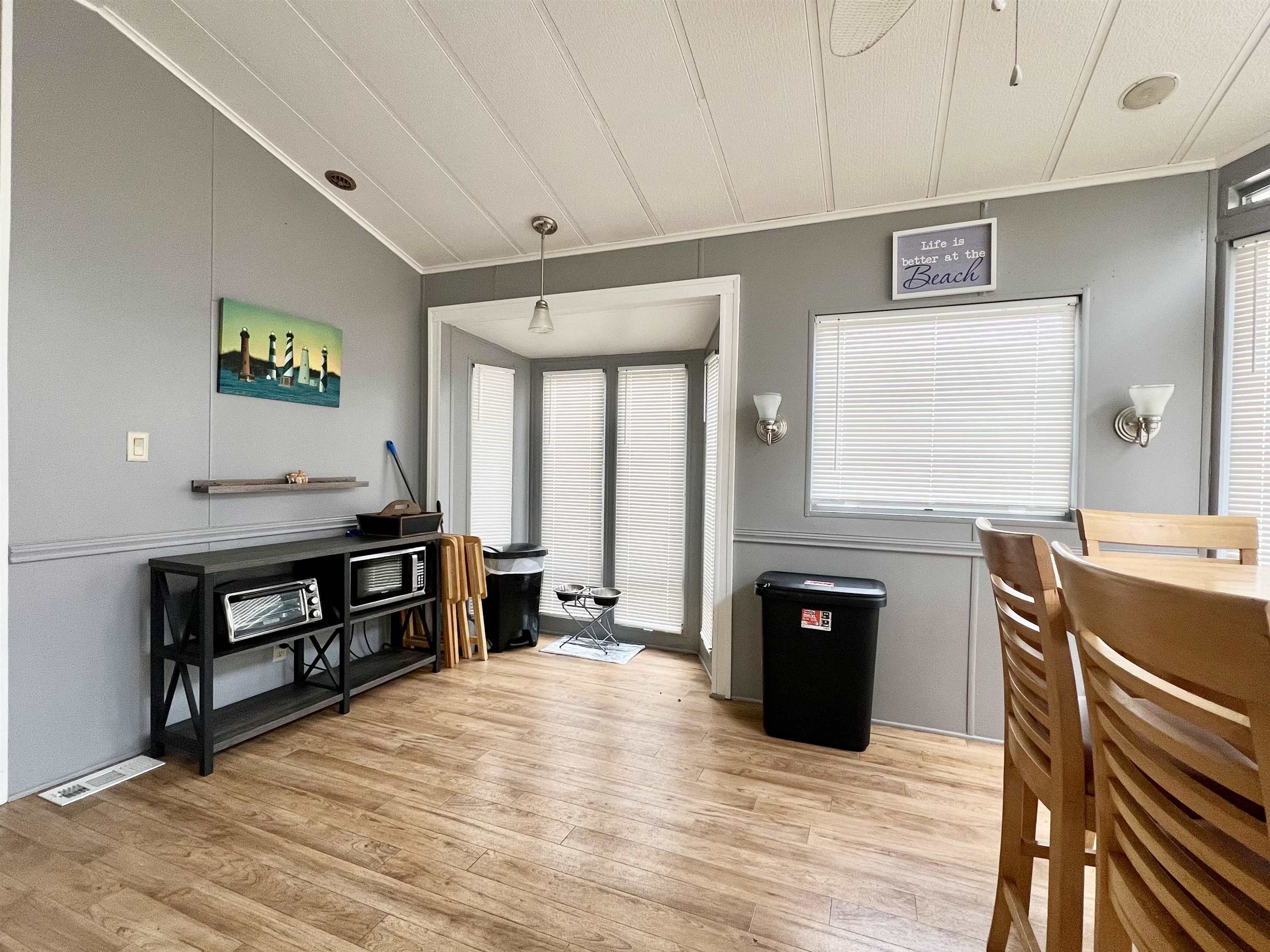 709 Seashore Road Cape May, NJ 08204 - Photo 8 of 29 a view of a livingroom with furniture and window
