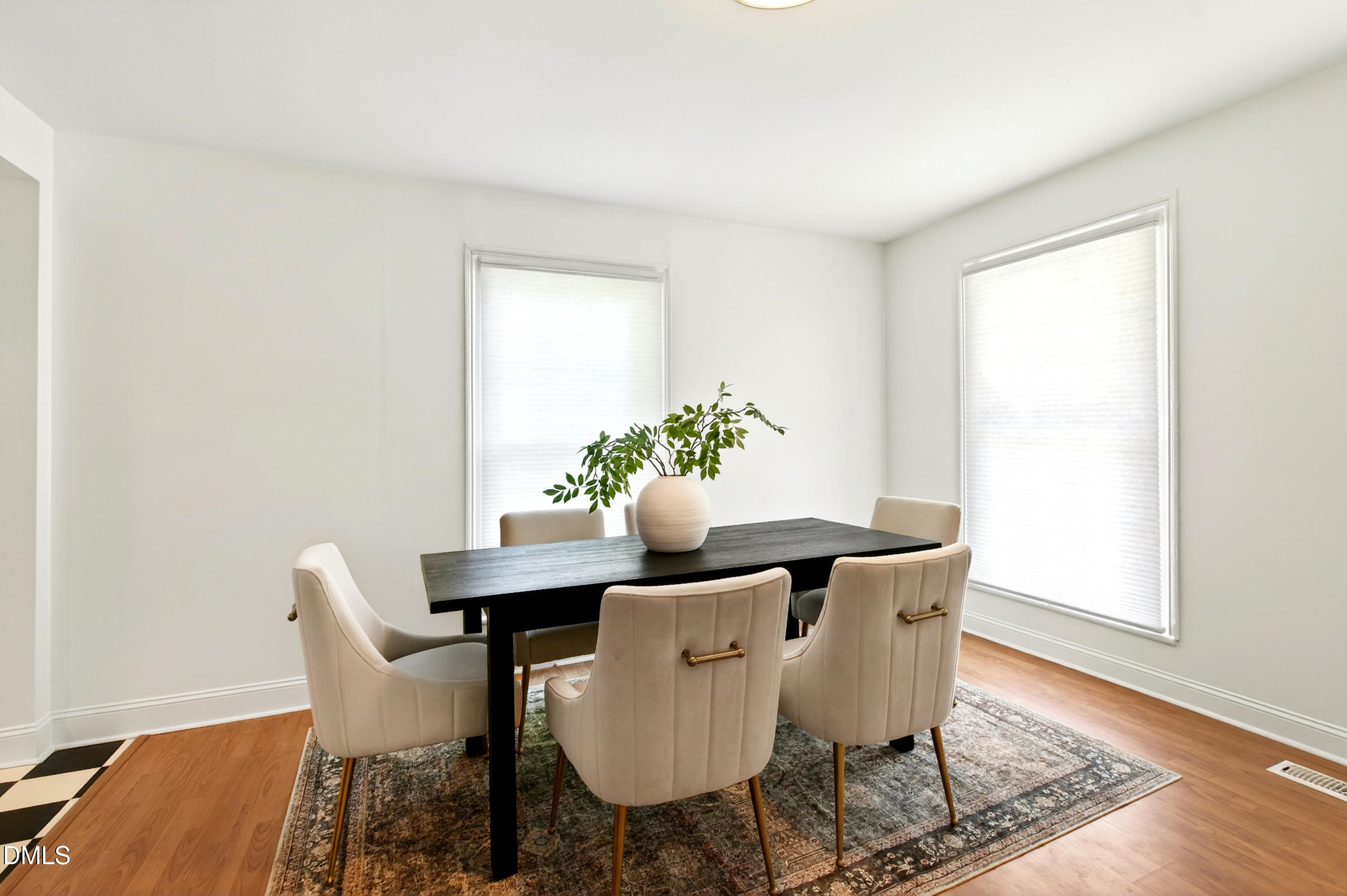 913 Washington Street Durham, NC 27701 - Photo 9 of 37 a dining room with furniture and wooden floor