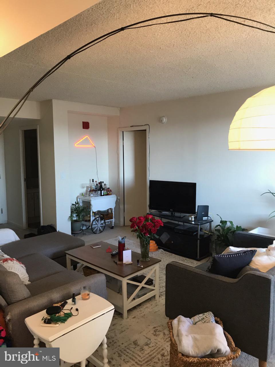 530 South 2nd Street, Unit 610 Philadelphia, PA 19147 - Photo 1 of 21 a living room with furniture and a flat screen tv