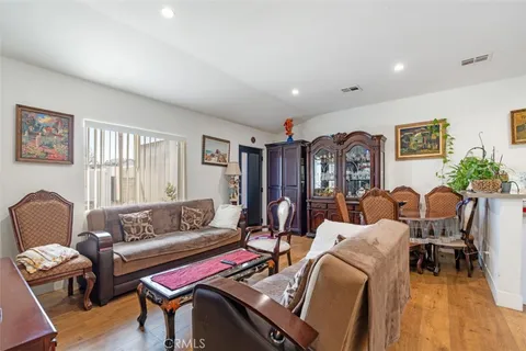a view of a workspace with furniture and a livingroom