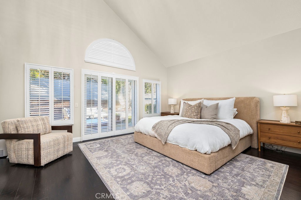1 Via Colorso San Clemente, CA 92672 - Photo 11 of 24 a spacious bedroom with a bed and glass window