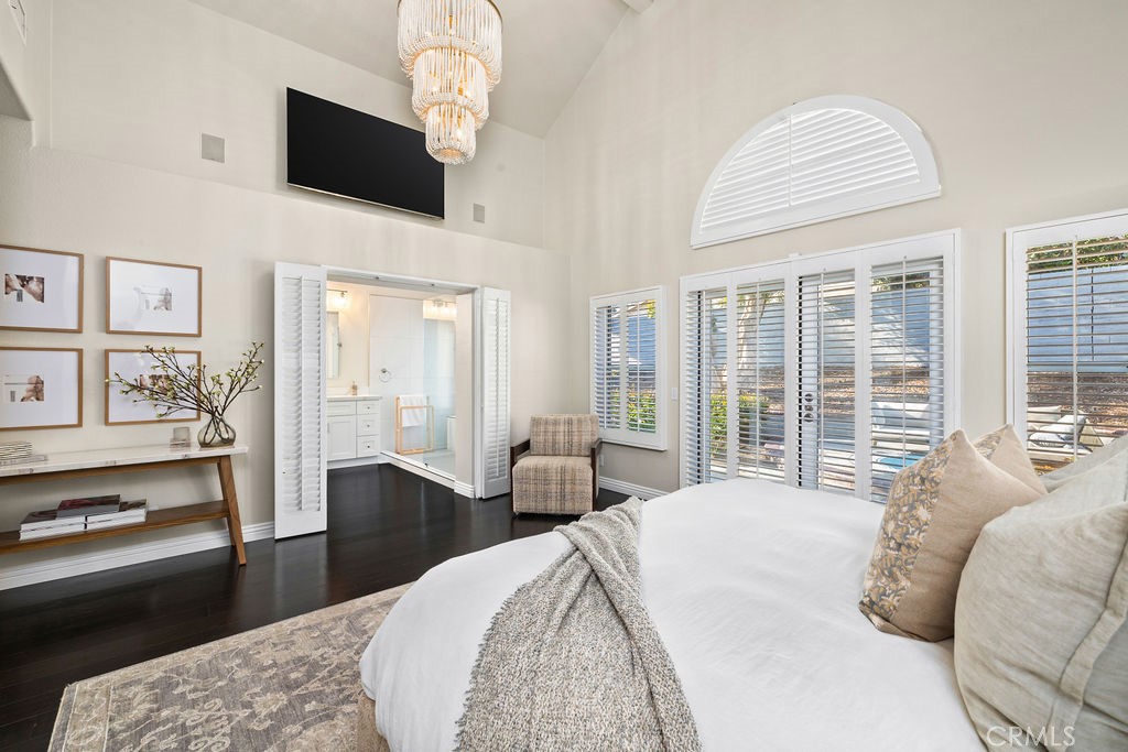 1 Via Colorso San Clemente, CA 92672 - Photo 12 of 24 a spacious bedroom with a large bed and a flat screen tv