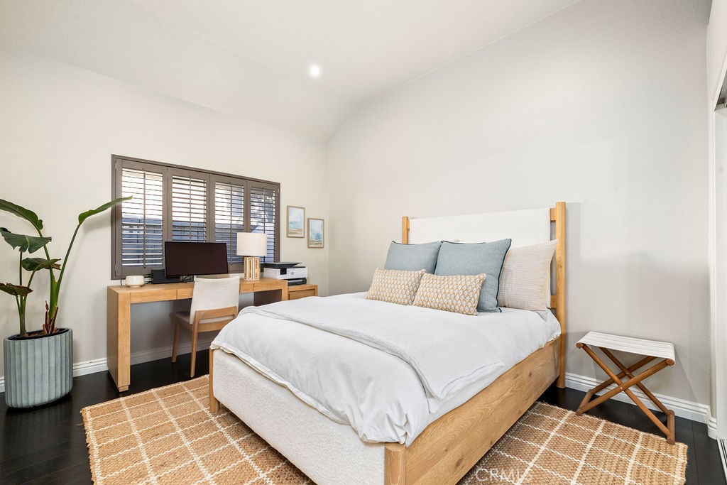 1 Via Colorso San Clemente, CA 92672 - Photo 15 of 24 a bedroom with a bed and wooden floor