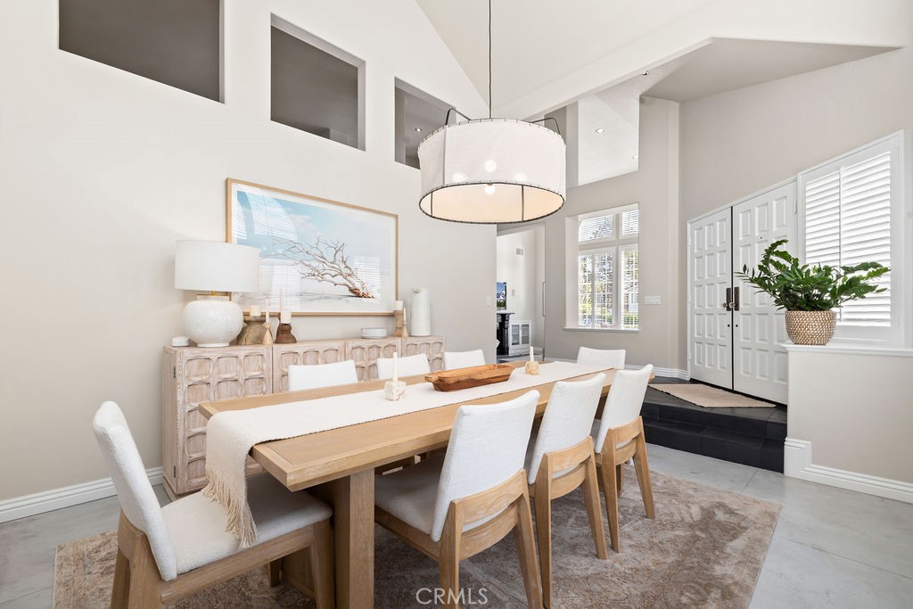 1 Via Colorso San Clemente, CA 92672 - Photo 8 of 24 a view of a dining room with furniture and a chandelier