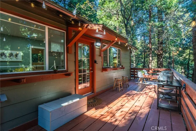 a view of a two chairs in the deck