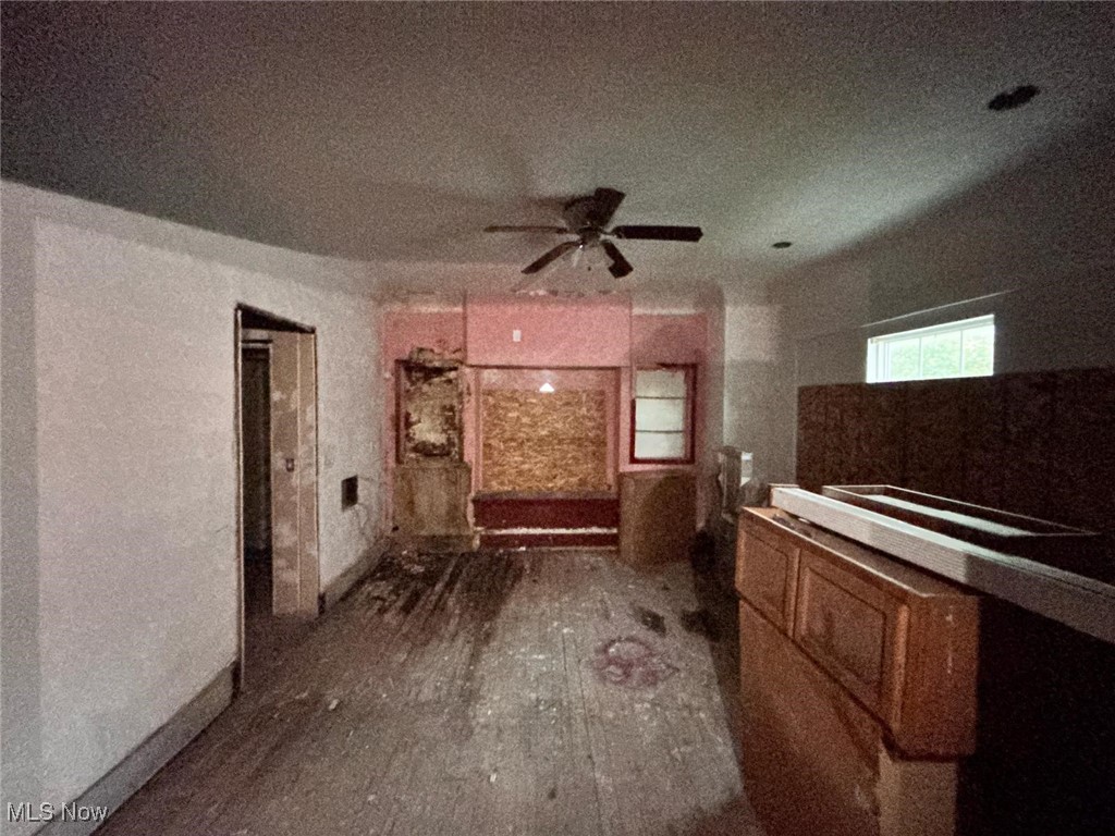 1888 Beersford Road Cleveland, OH 44112 - Photo 11 of 22 Bathroom with ceiling fan, dark wood-type flooring, and vanity