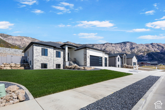 710 East Mountain Road Ogden, UT 84414 - Photo 2 of 10 Modern exterior featuring light-colored stone and dark siding accents