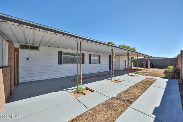 a front view of a house with a patio