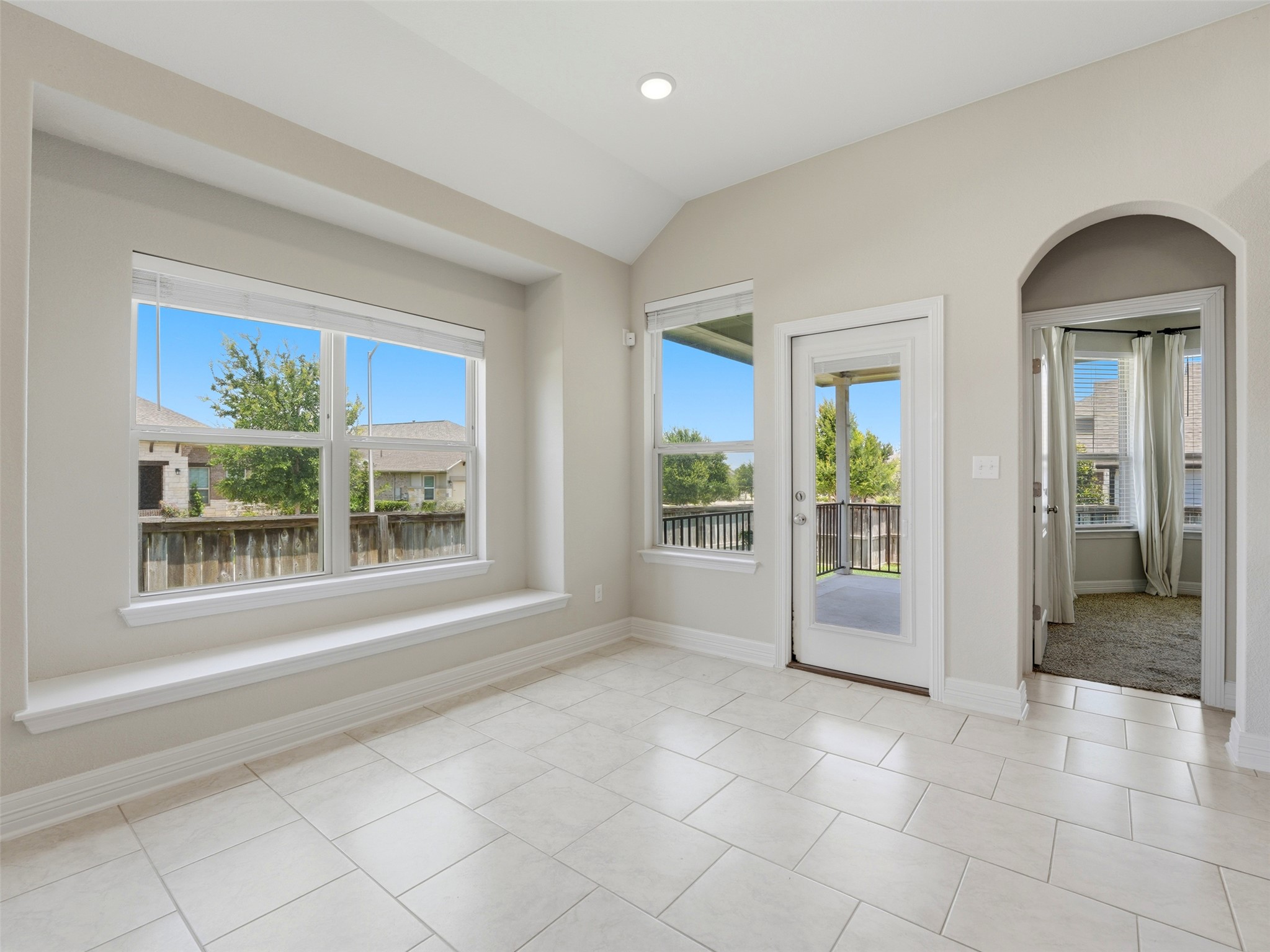 2132 Ringstaff Road Leander, TX 78641 - Photo 17 of 39 A well-lit sitting area with a window seat and exterior access to a private balcony.