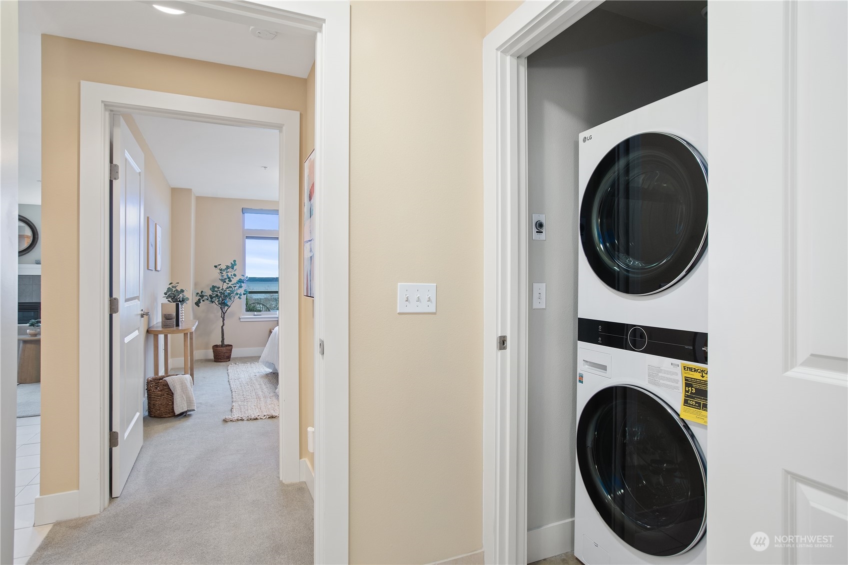 51 Pine Street, Unit 104 Edmonds, WA 98020 - Photo 28 of 40 a view of a hallway with washer and dryer