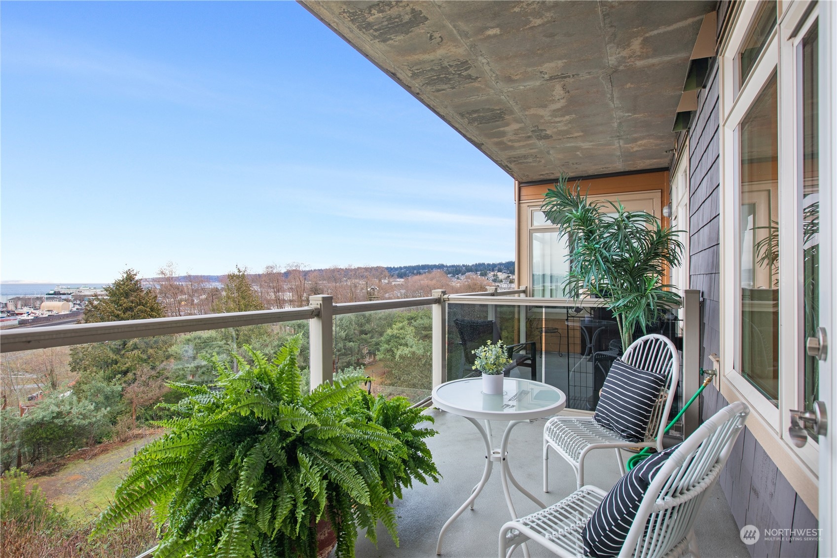 51 Pine Street, Unit 104 Edmonds, WA 98020 - Photo 31 of 40 a view of balcony with furniture and garden