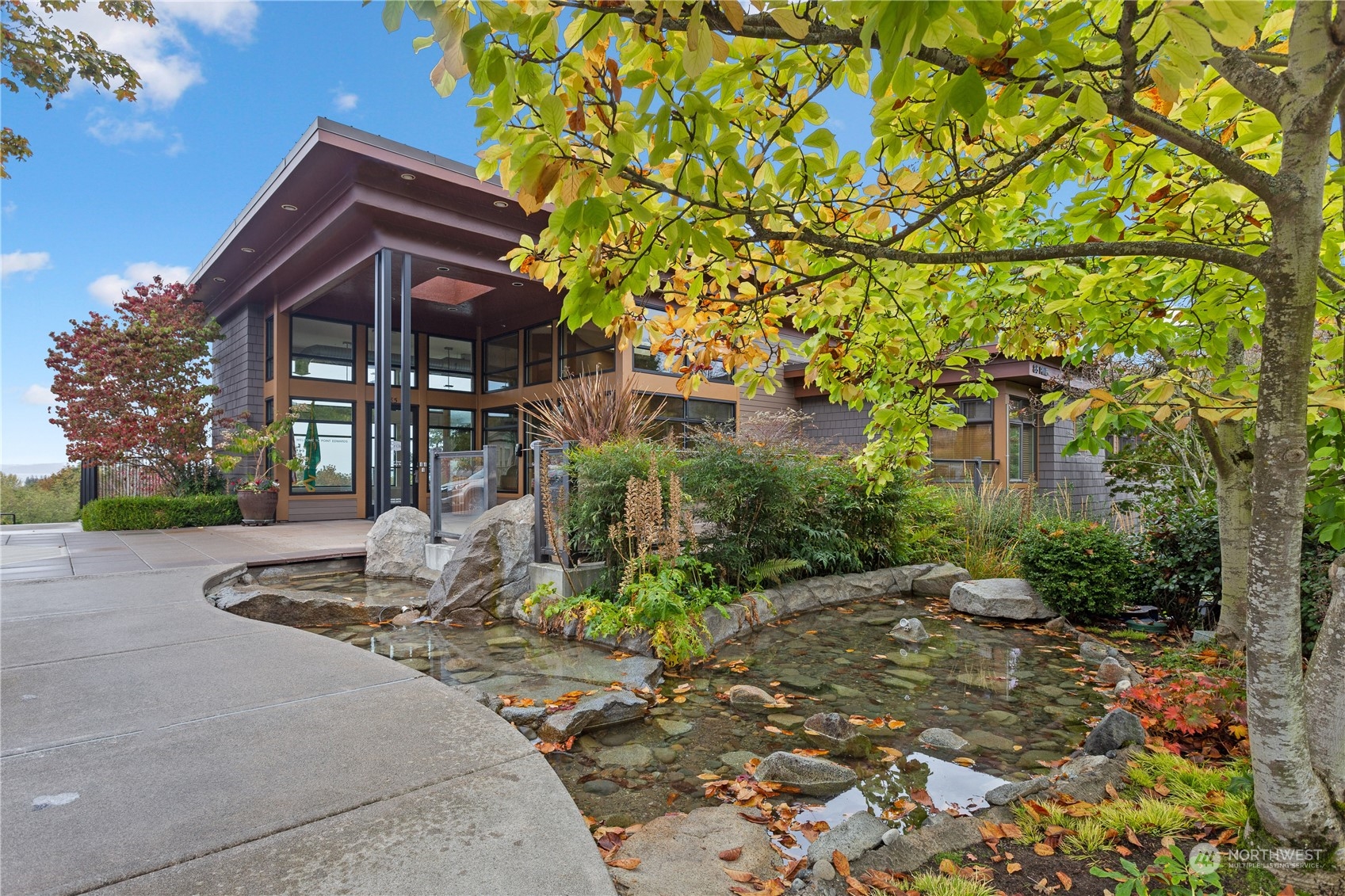 51 Pine Street, Unit 104 Edmonds, WA 98020 - Photo 33 of 40 a front view of a house with garden