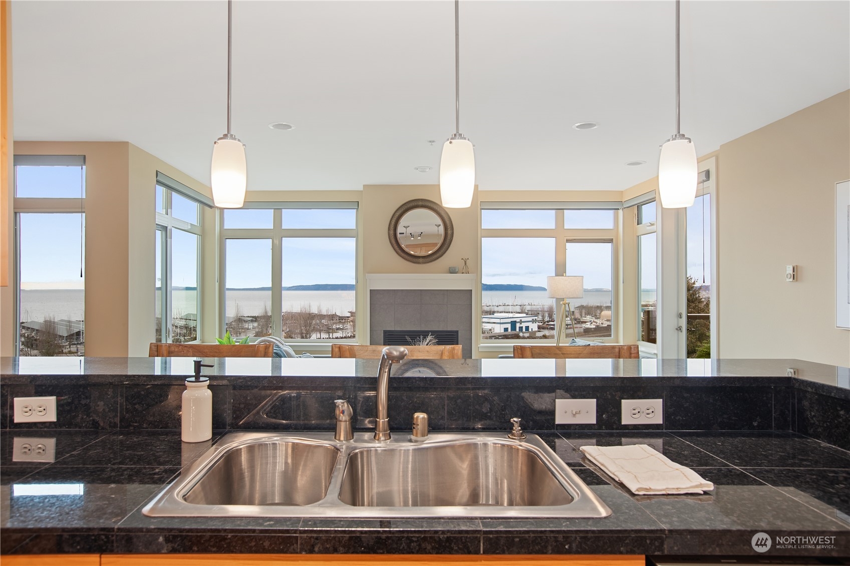 51 Pine Street, Unit 104 Edmonds, WA 98020 - Photo 7 of 40 a view of a room with furniture window and wooden floor