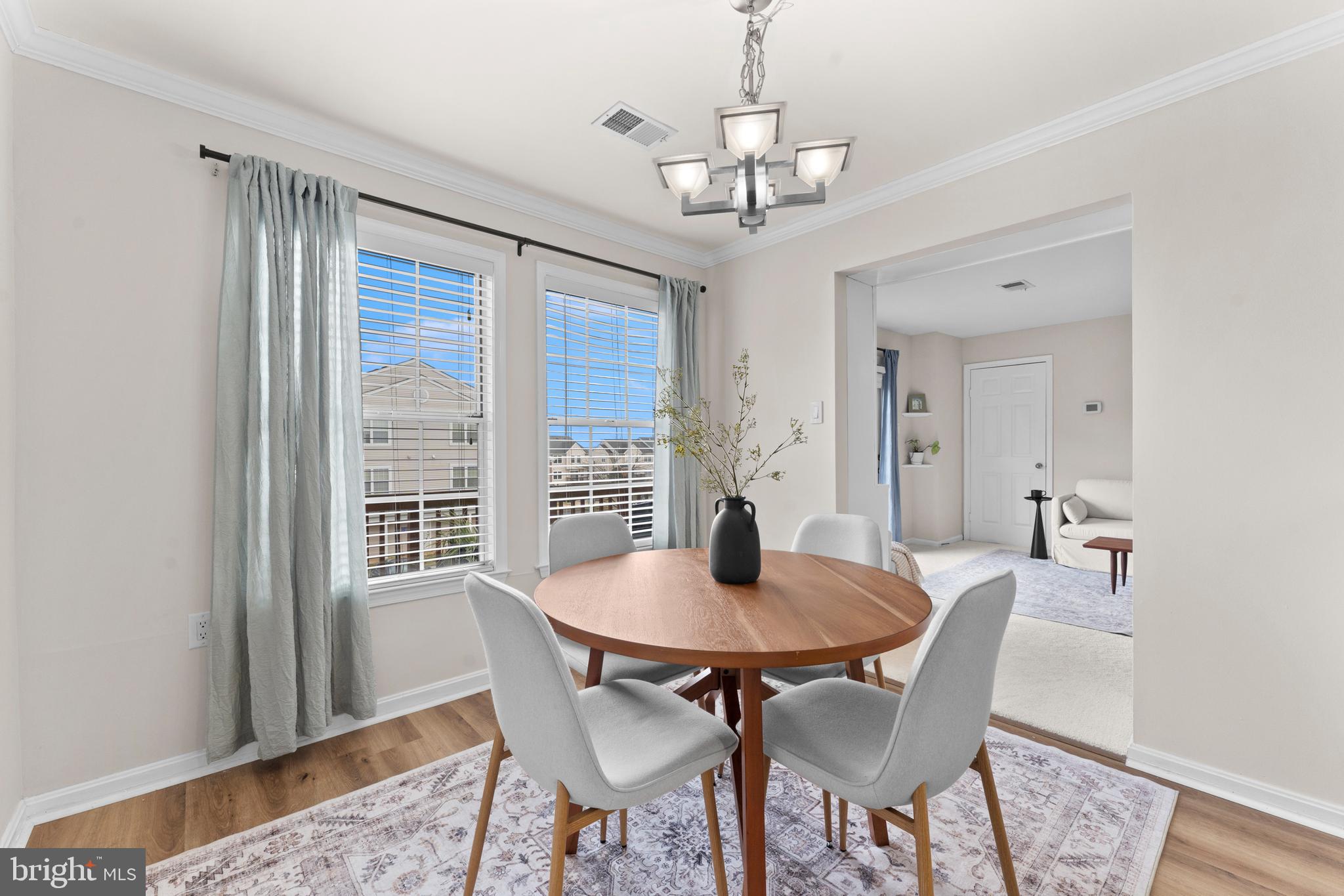 11184 Stagestone Way Manassas, VA 20109 - Photo 23 of 38 a view of a dining room with furniture window and wooden floor