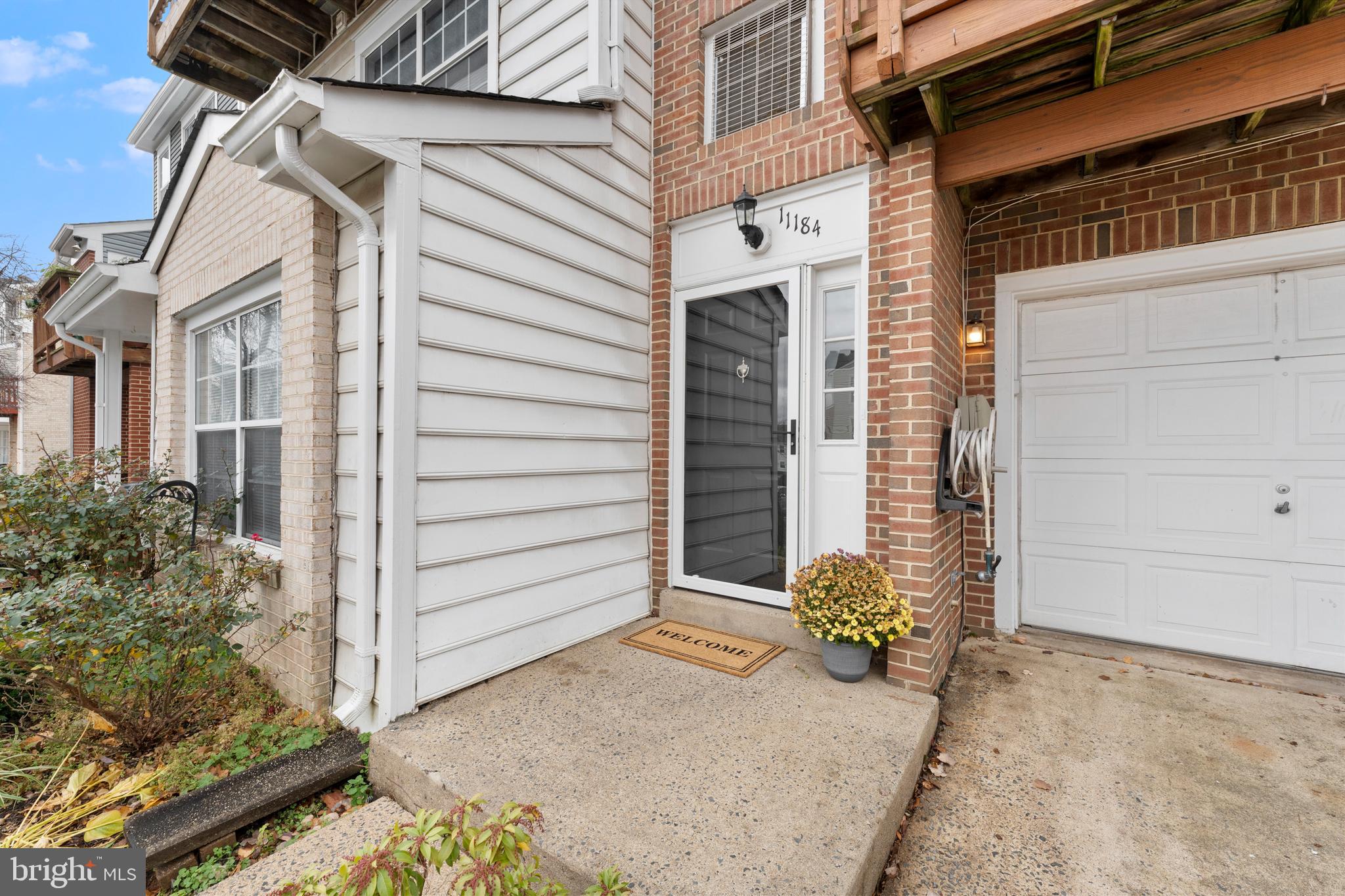 11184 Stagestone Way Manassas, VA 20109 - Photo 3 of 38 a view of a house with backyard