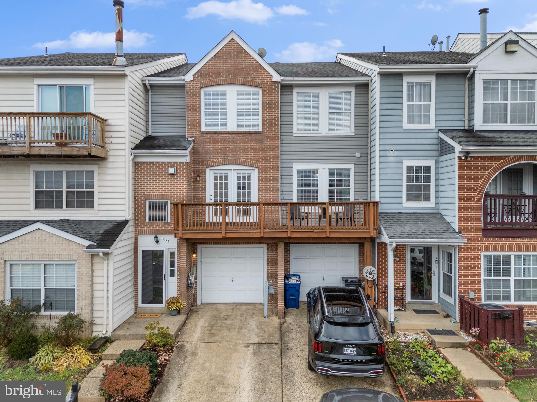 11184 Stagestone Way Manassas, VA 20109 - Photo 35 of 38 a front view of a house with parking